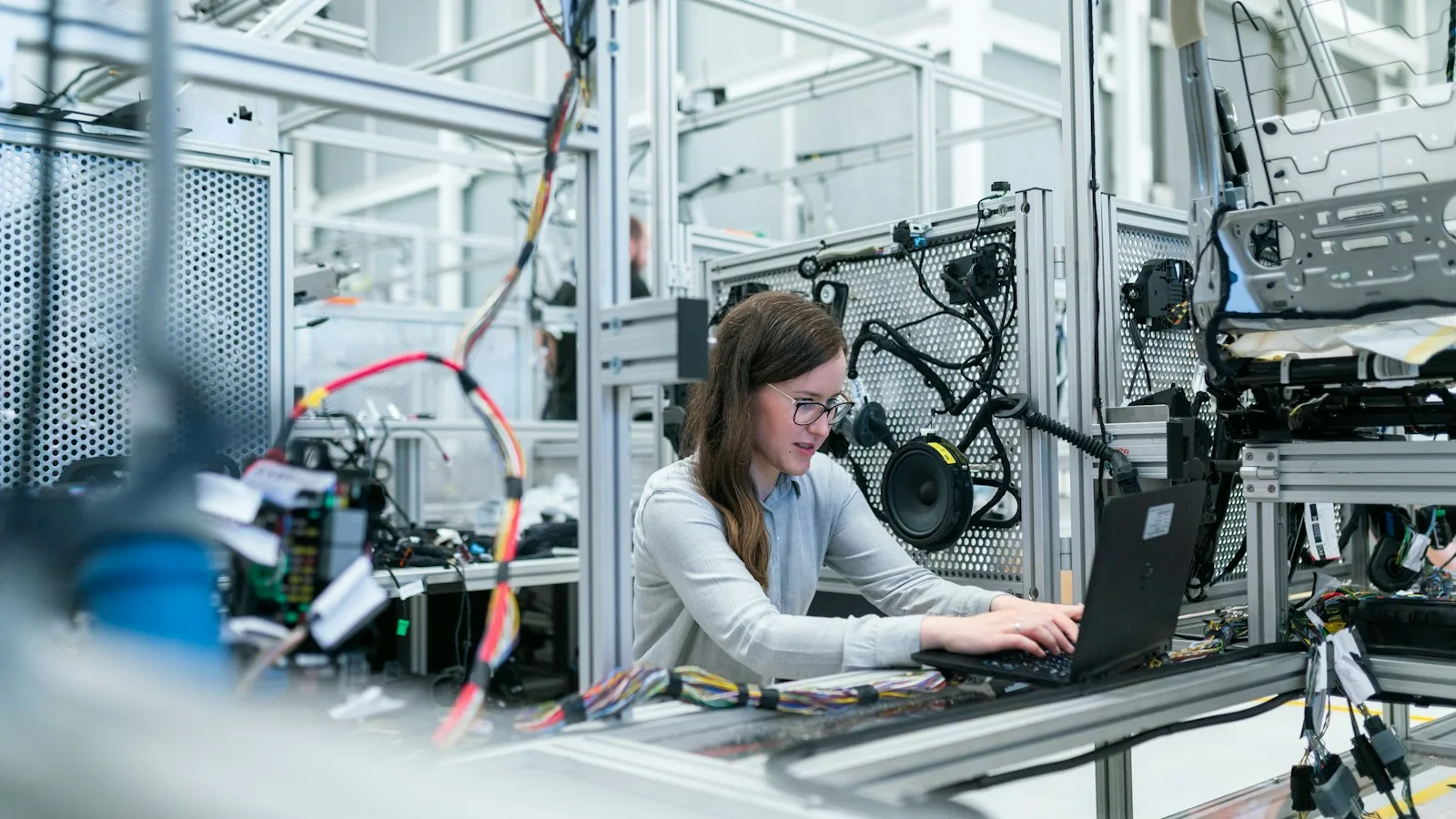 Connected industry — engineer on an industrial floor